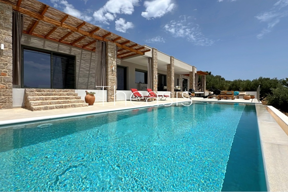 Modern Villa ref.381: Newly built (2023) villa with stunning sunset, sea and island views, Hillside location in Akritochori – Finikounda area, Plot 5571.95 m² with olive trees, Modern design, Living area 162 m² (182 m² including the walls), 3 Βedrooms, 2 Βathrooms, Storage area, Swimming pool with infinity, Large terraces partly shaded, Easy access.